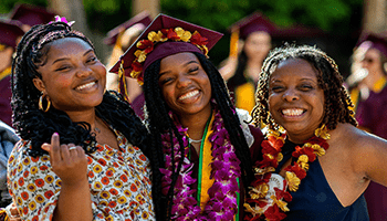 Image of Starbucks graduate with their family.