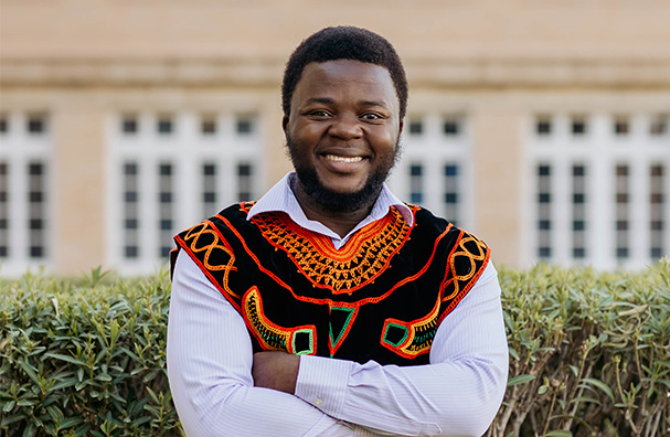 man in a colorful top smiling