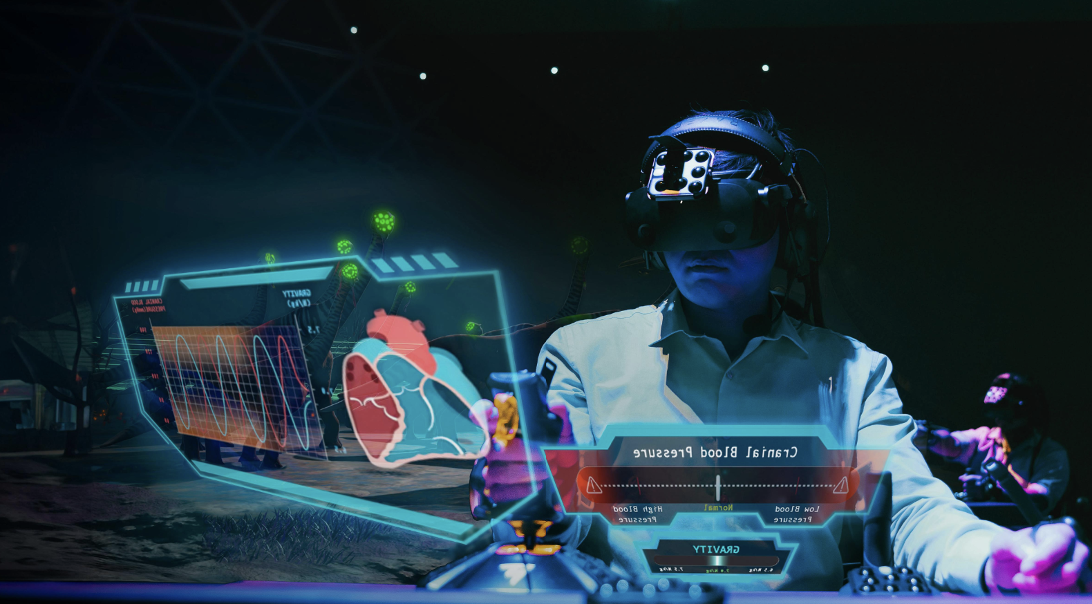 Person using a VR headset to interact with a holographic heart display.